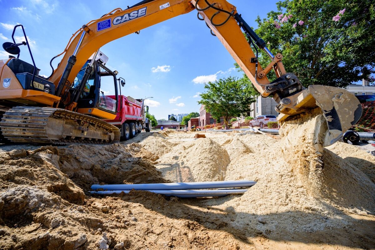 Underground utility work, the scale of a buried service line