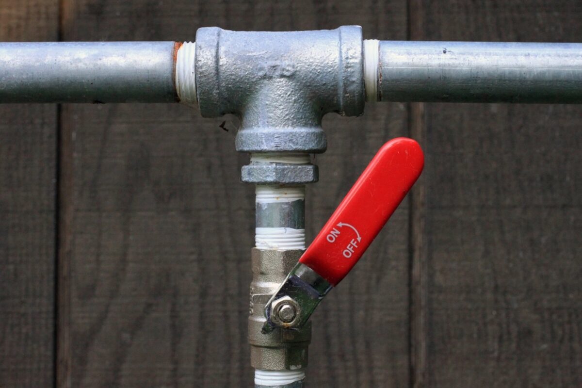 A quarter turn ball valve on a water line, the style of shutoff found on many newer service lines